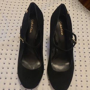 Black Calvin Klein pumps